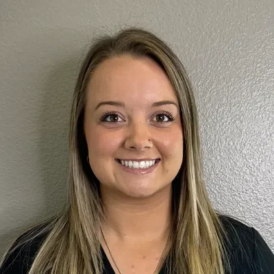 Katelyn Sawyer smiling, she has blonde hair.